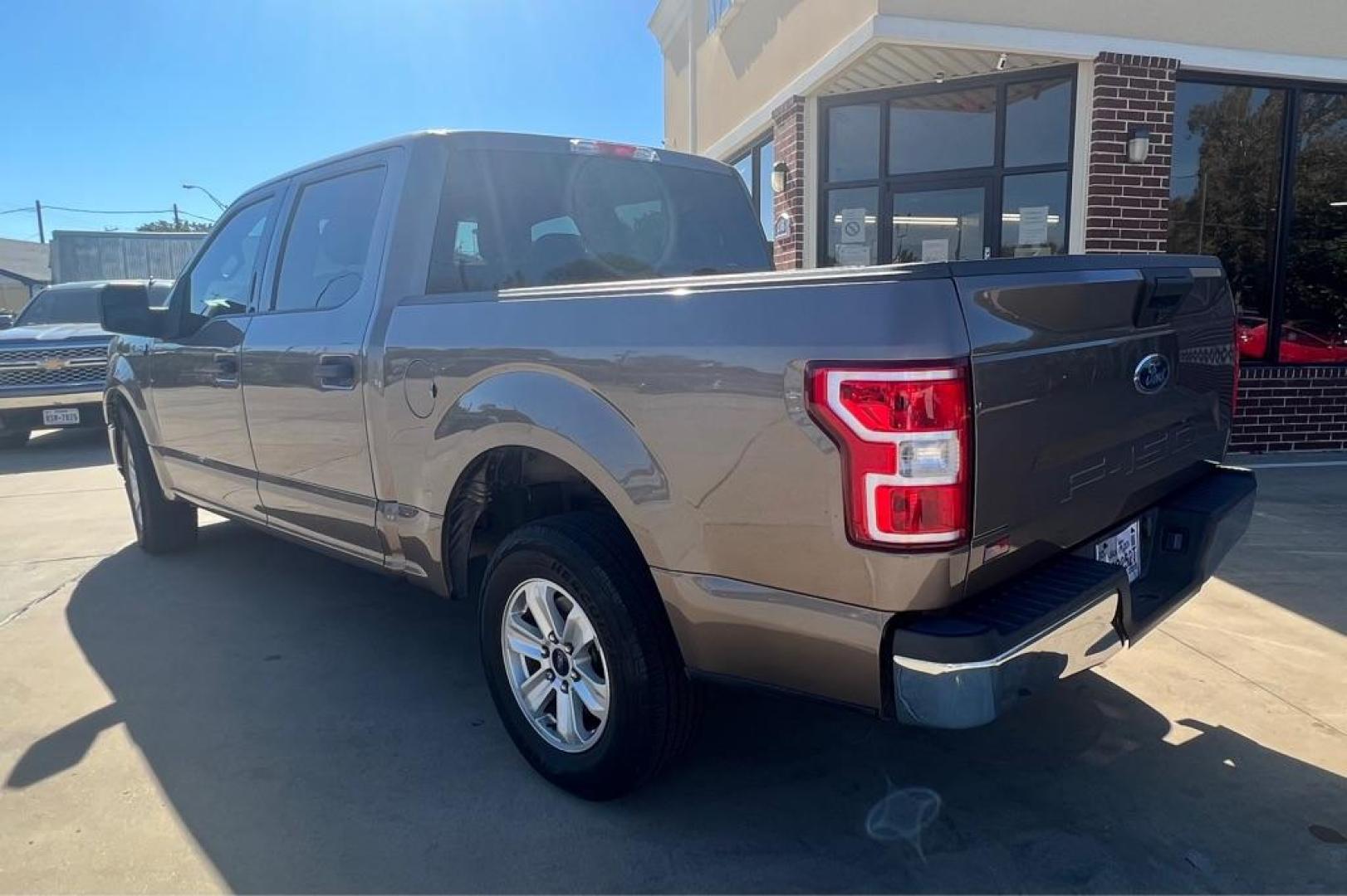 2018 Gray FORD F150 SUPERCREW (1FTEW1C55JK) with an 5.0L engine, Automatic transmission, located at 4415 NE 28th St, Haltom City, TX, 76117, (817) 222-9334, 32.795322, -97.280937 - Photo#2