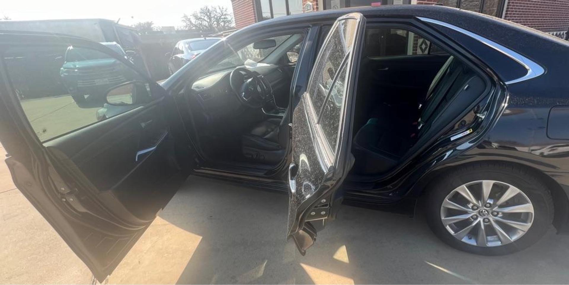 2015 BLACK TOYOTA CAMRY HYBRID (4T1BD1FK3FU) with an 2.5L engine, Continuously Variable transmission, located at 4415 NE 28th St, Haltom City, TX, 76117, (817) 222-9334, 32.795322, -97.280937 - Photo#9