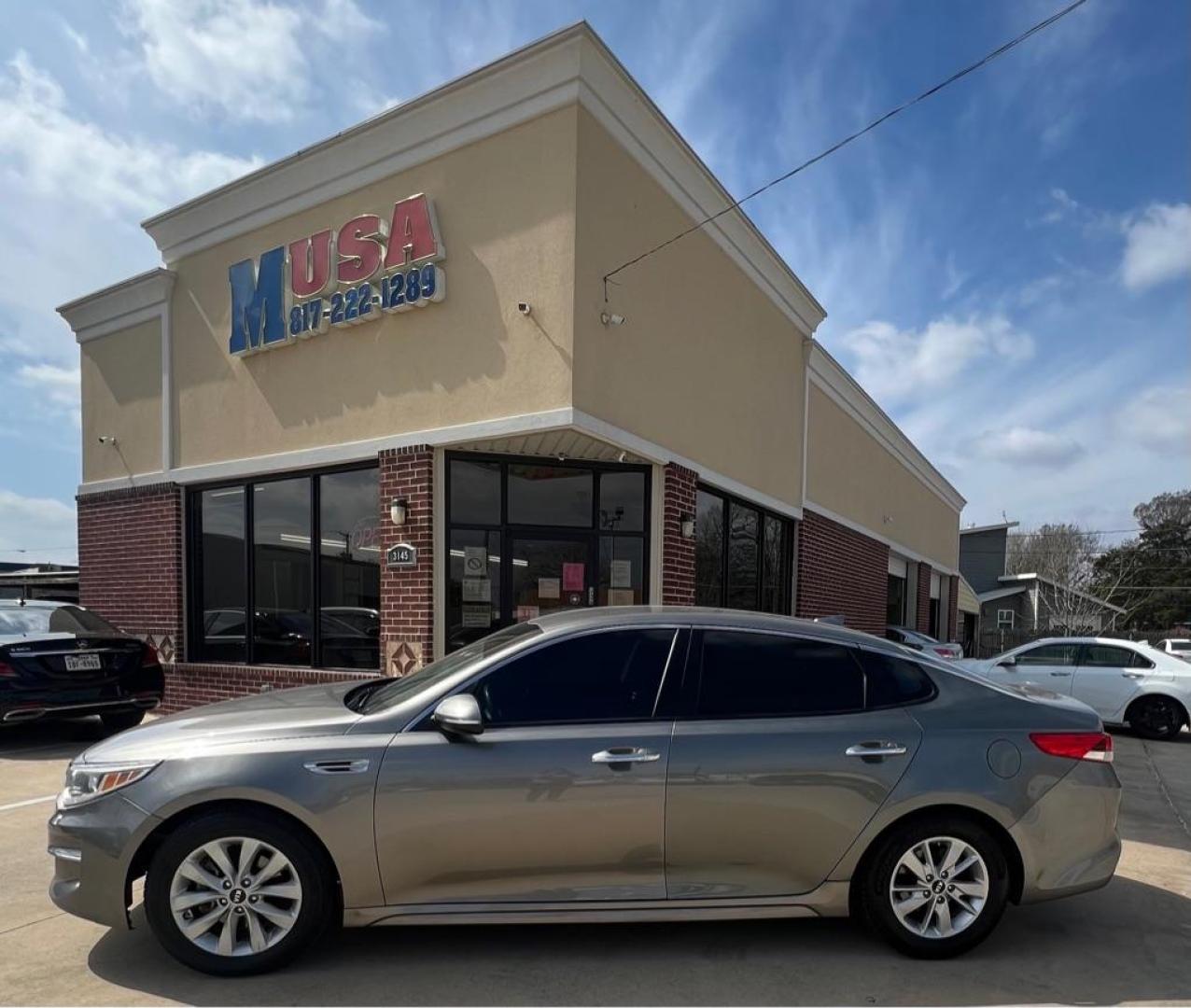 2017 Silver KIA OPTIMA LX (5XXGT4L37HG) with an 2.4L engine, Automatic transmission, located at 4415 NE 28th St, Haltom City, TX, 76117, (817) 222-9334, 32.795322, -97.280937 - Photo#0