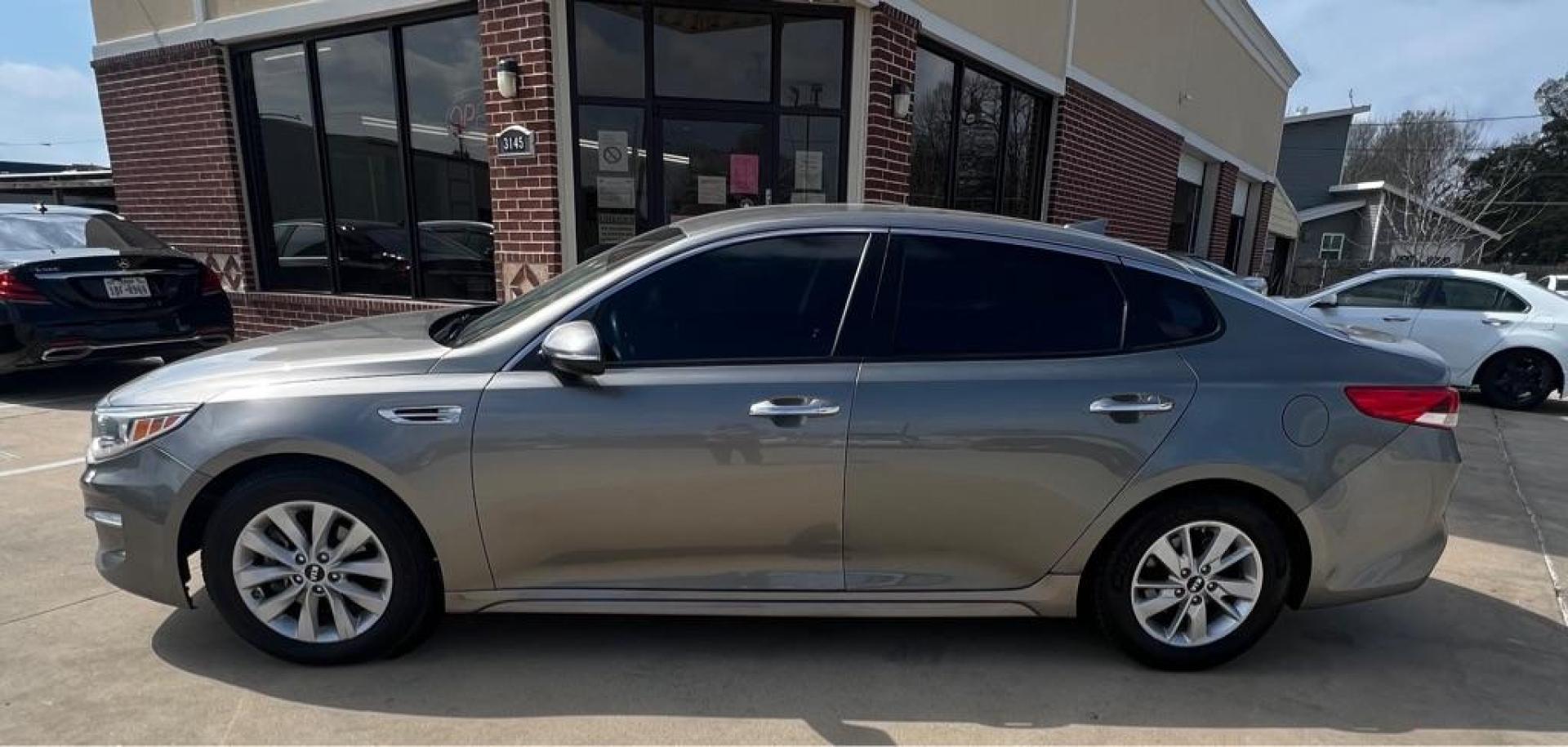 2017 Silver KIA OPTIMA LX (5XXGT4L37HG) with an 2.4L engine, Automatic transmission, located at 4415 NE 28th St, Haltom City, TX, 76117, (817) 222-9334, 32.795322, -97.280937 - Photo#6