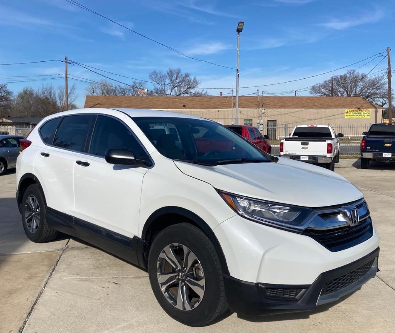 2019 WHITE HONDA CR-V LX (2HKRW5H39KH) with an 2.4L engine, Continuously Variable transmission, located at 4415 NE 28th St, Haltom City, TX, 76117, (817) 222-9334, 32.795322, -97.280937 - Photo#1