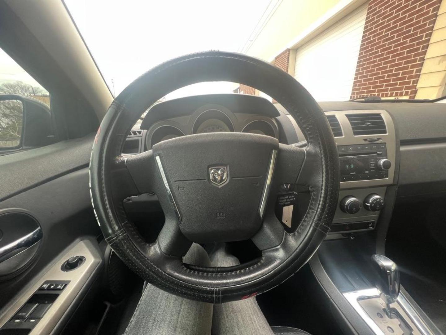 2009 SILVER DODGE AVENGER SXT (1B3LC56B09N) with an 2.4L engine, Automatic transmission, located at 4415 NE 28th St, Haltom City, TX, 76117, (817) 222-9334, 32.795322, -97.280937 - Photo#11