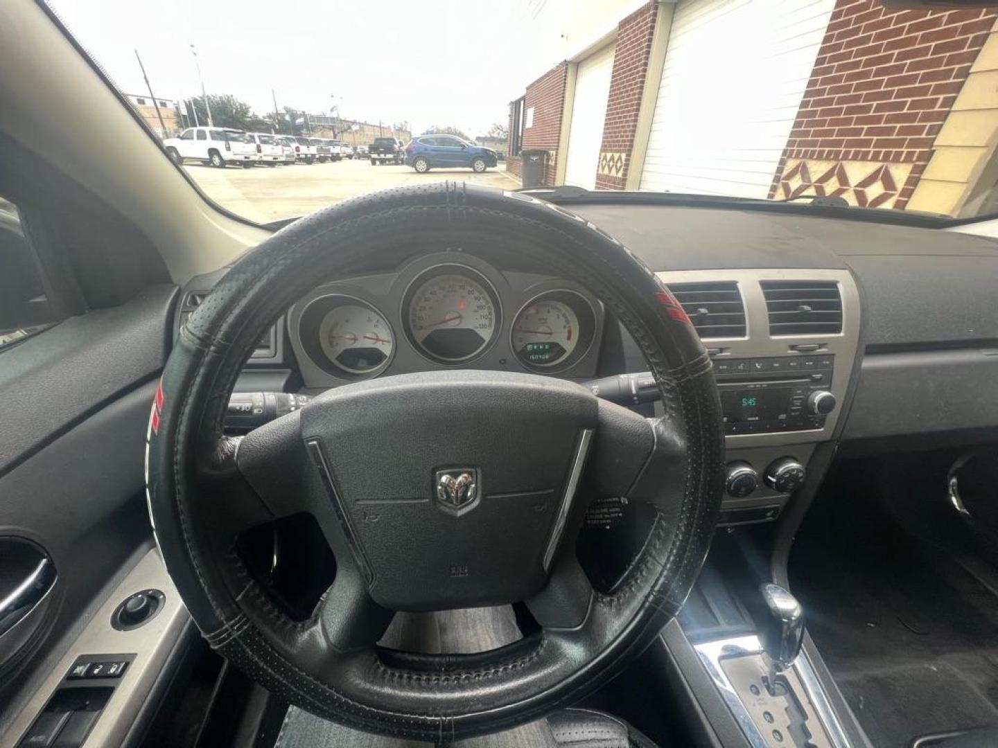 2009 SILVER DODGE AVENGER SXT (1B3LC56B09N) with an 2.4L engine, Automatic transmission, located at 4415 NE 28th St, Haltom City, TX, 76117, (817) 222-9334, 32.795322, -97.280937 - Photo#12