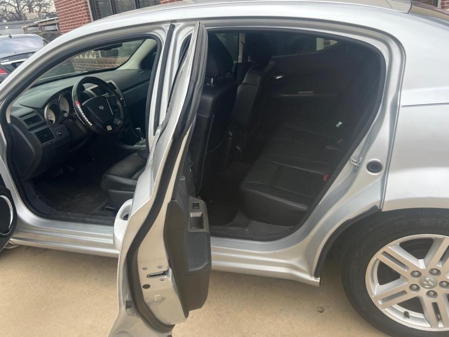 2009 SILVER DODGE AVENGER SXT (1B3LC56B09N) with an 2.4L engine, Automatic transmission, located at 4415 NE 28th St, Haltom City, TX, 76117, (817) 222-9334, 32.795322, -97.280937 - Photo#8